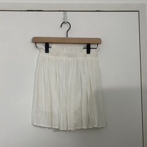 Pleated white skirt with safety shorts